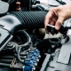 man checking a car radiator