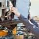 mechanic changing radiator